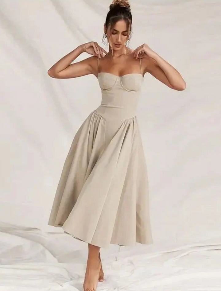 Chic women's V-neck midi dress for summer. Casual, flowy, and perfect for vacation or everyday wear.