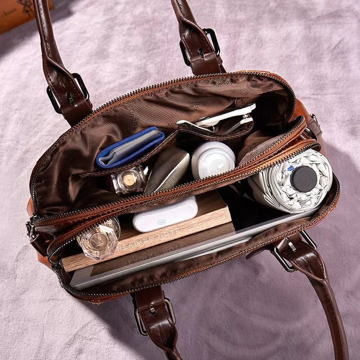 Retro style women's fashion accessory, a versatile leather handbag.