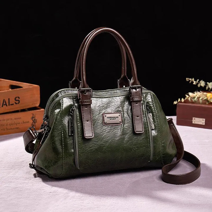 Classic women's leather handbag with vintage elegance, a must-have accessory.