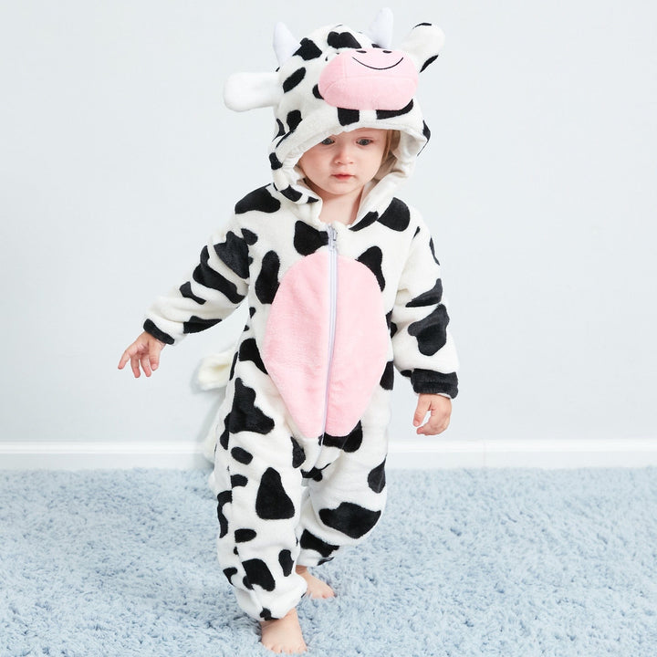 Cute cow print children's animal onesie, soft toddler sleepwear for fun nights.