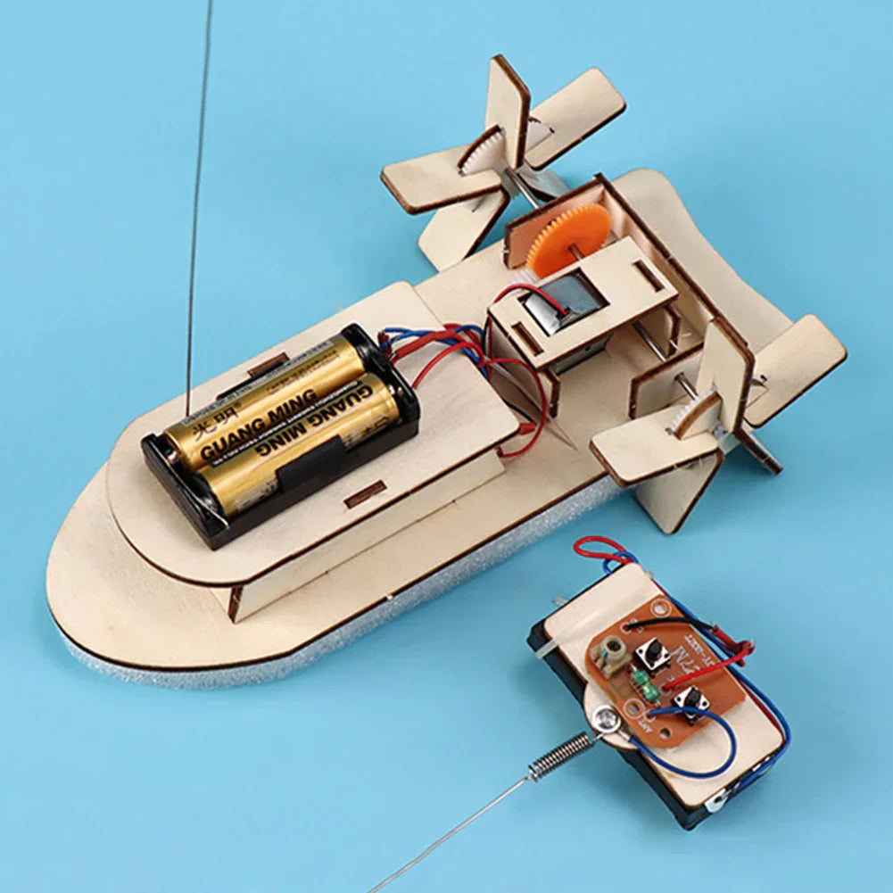 Finished wooden electric toy boat, built by a child from a DIY educational kit.