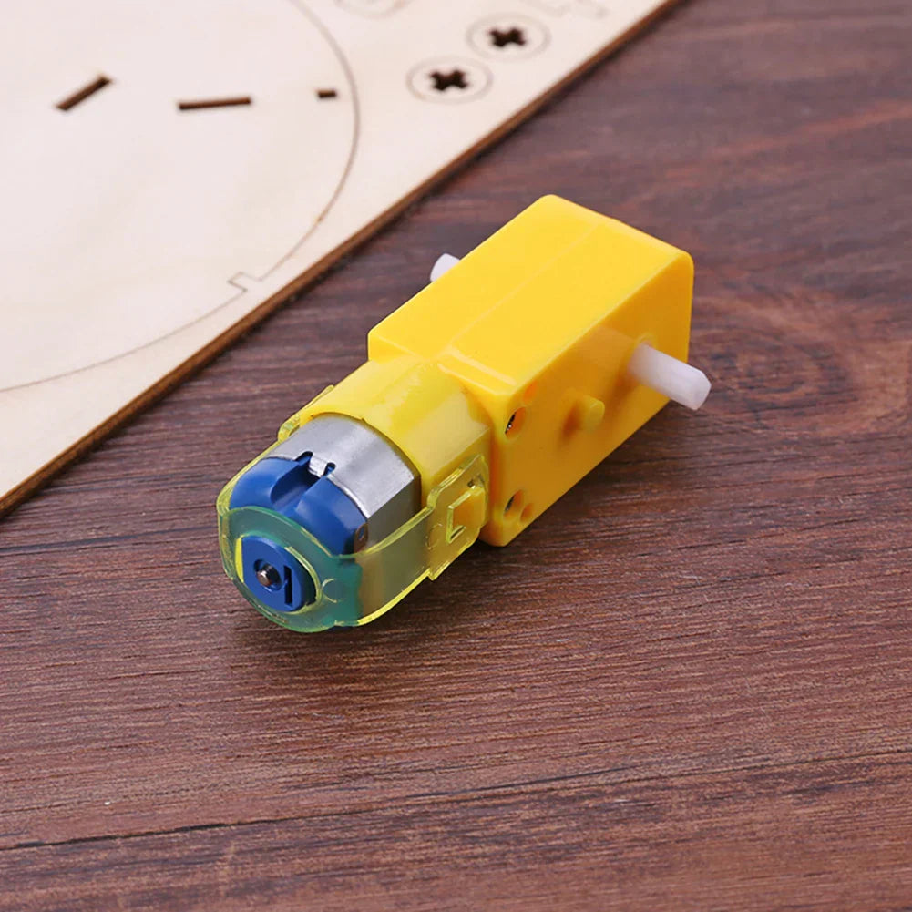 Wooden electric toy boat floating in water, demonstrating its DIY propeller function.
