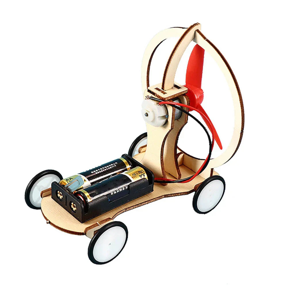 Wooden components of a DIY electric toy boat kit, ready for children's assembly.