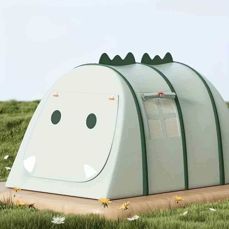 Young child enjoying imaginative play inside a fun dinosaur-shaped tent