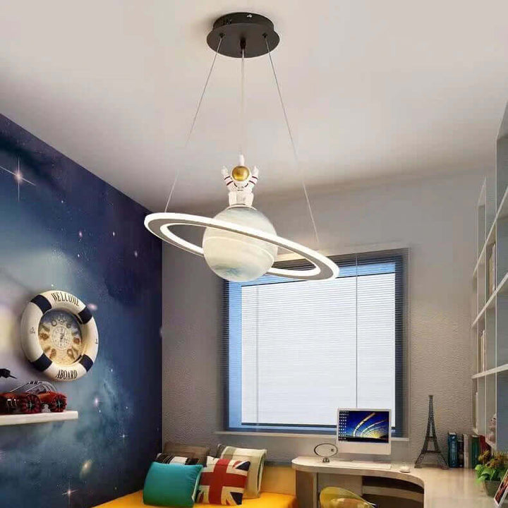 Fun planet pendant light, perfect for inspiring imaginative play in kids.