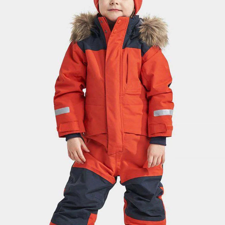 Durable waterproof children's ski overall with adjustable hood. An insulated outdoor jumpsuit for active winter play.