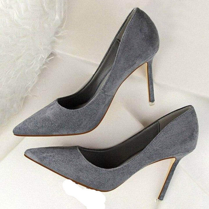 Formal women's classic high heel pumps. Essential elegant shoes for professional settings or sophisticated evening events.
