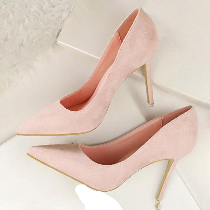 Elegant side profile of women's classic high heel pumps. Showcases sleek design and stylish, comfortable fit.