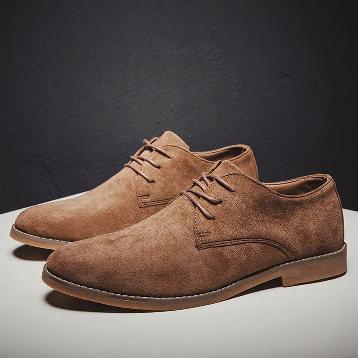 Men's formal black leather lace-up shoes, a classic choice for elegant business & wedding attire.
