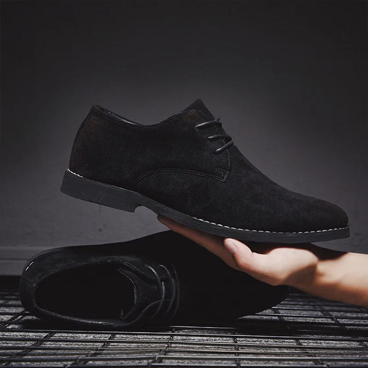 Stylish men's dress shoes, black lace-up, suitable for formal wear, weddings, & office settings.
