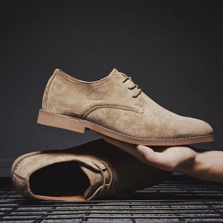 Sophisticated men's black lace-up dress shoes, essential for formal events & business attire.