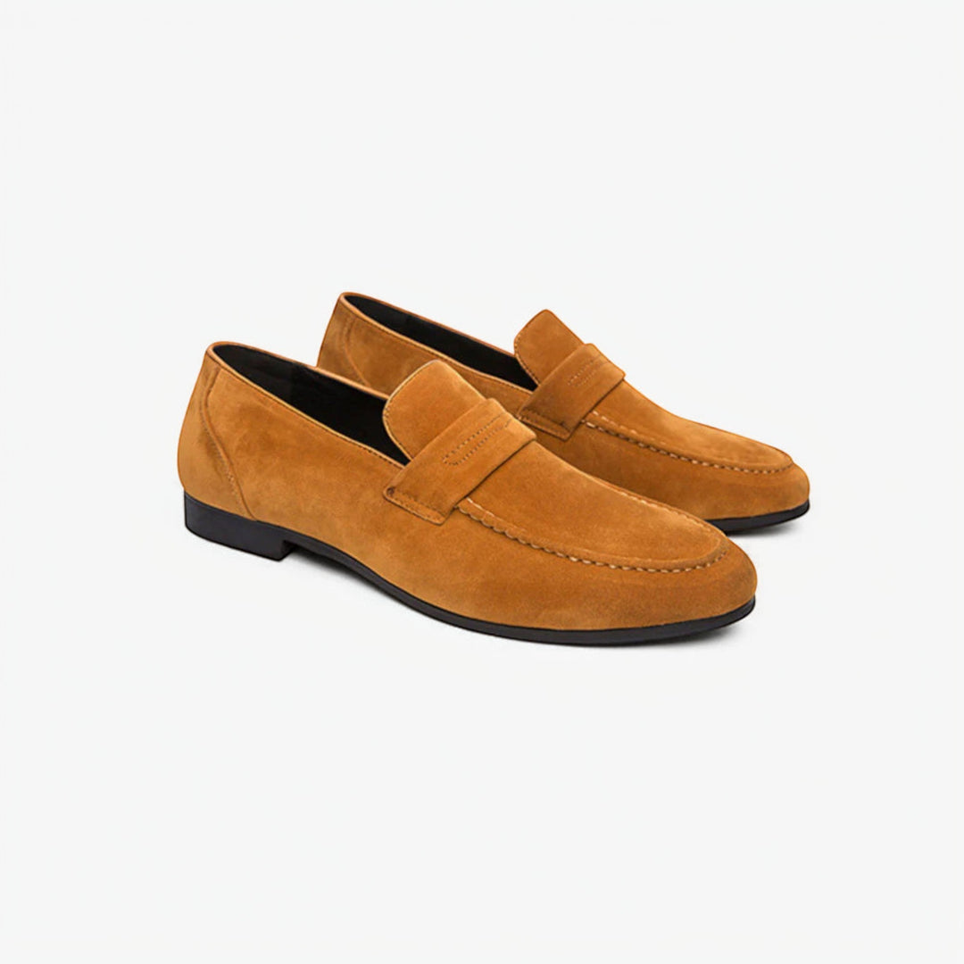 Versatile men's brown leather loafers for casual outings & smart business attire. Stylish slip-on shoes.