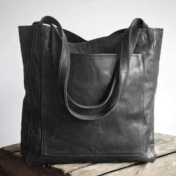 Versatile coffee women's shoulder bag, offering everyday elegance & practical organized carry. A classic fashion bag.