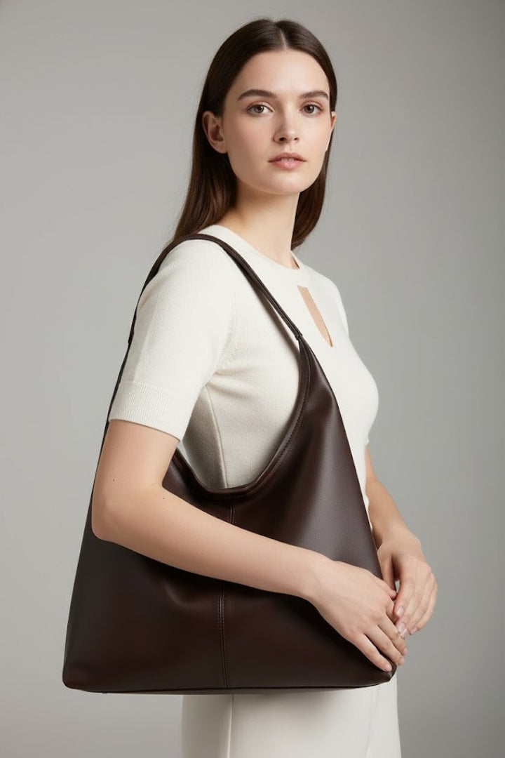 Minimalist classic faux leather tote bag, ideal for work and daily essentials.