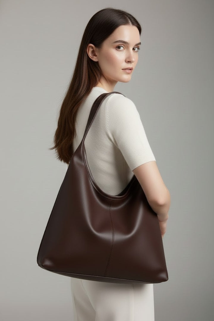 Chic faux leather women's tote, a classic and versatile shoulder bag.