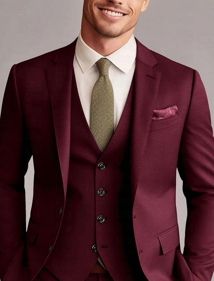 Sharp men's tailored 3-piece solid suit. Elegant business attire & formal wear for any special event.