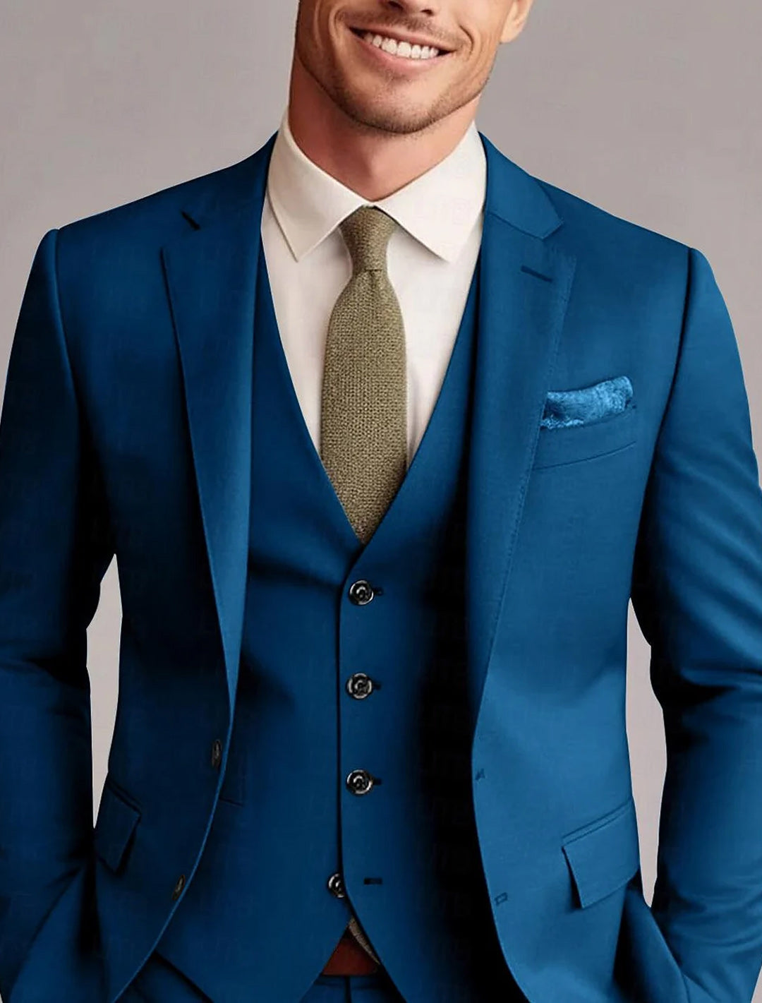 Professional men's 3-piece solid tailored suit. Sophisticated business attire & formal wear.