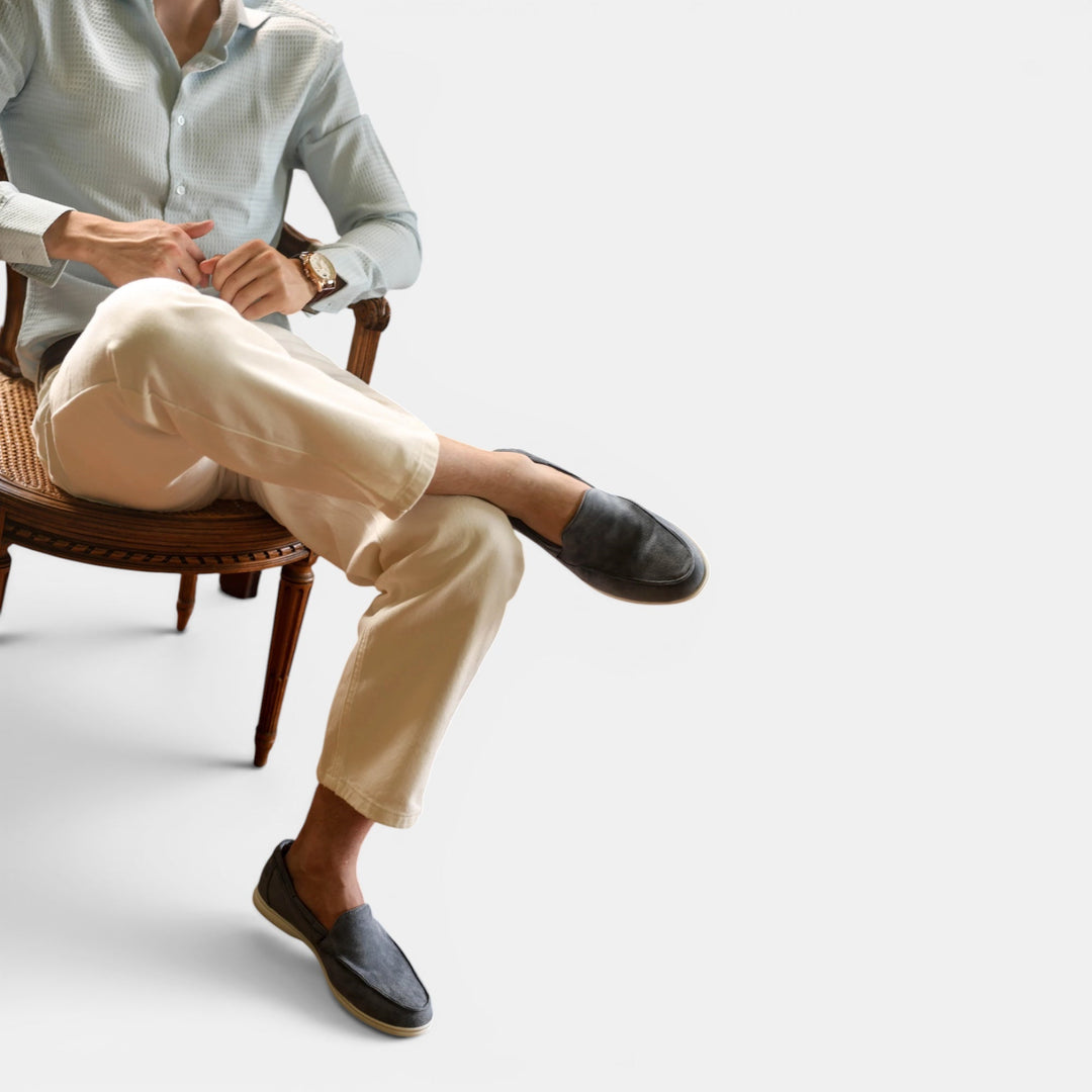 Modern men's slip-on loafers with a sleek design, perfect for comfortable casual footwear.