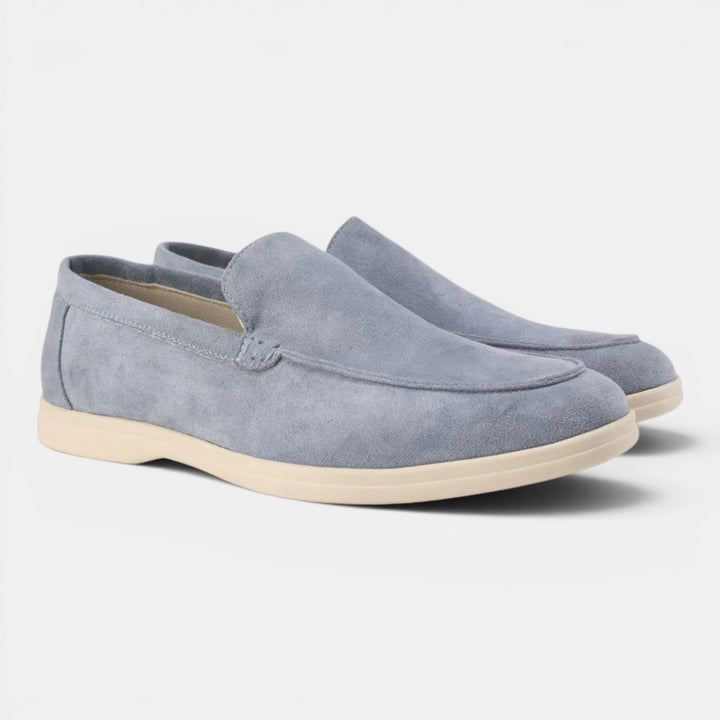 Distressed leather men's slip-on loafers, a rugged yet elegant casual footwear option.