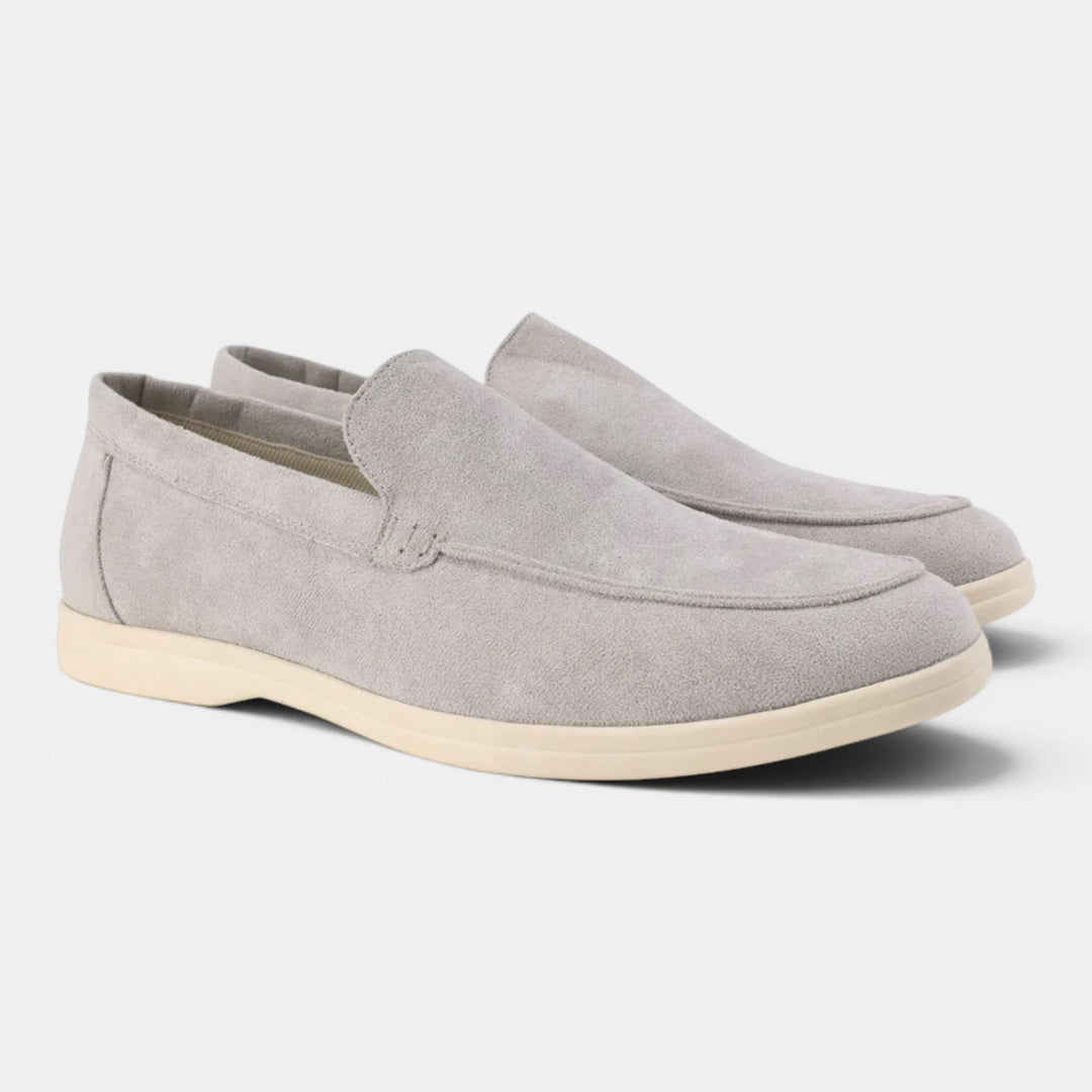 Men's slip-on loafers with a rubber sole, ensuring grip, comfort & durability for daily wear.