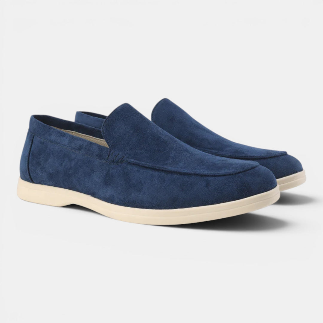 Hand-stitched men's slip-on loafers, showcasing quality craftsmanship & comfortable style.