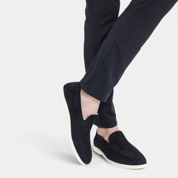 Stylish tan men's slip-on loafers, essential casual footwear for a comfortable and elegant look.