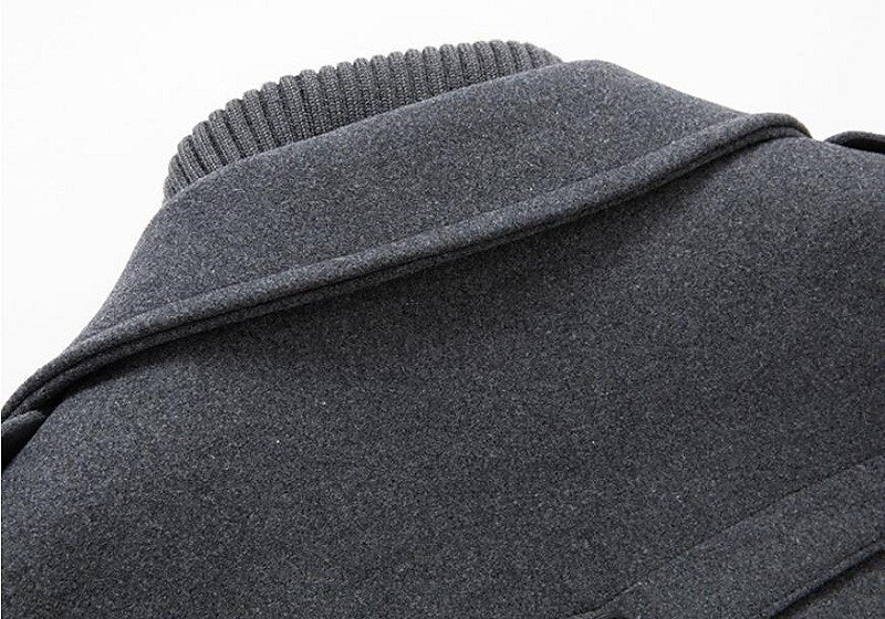 Gray men's classic double-breasted overcoat featuring a stylish notched lapel, perfect for winter fashion.