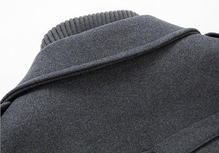 Gray men's classic double-breasted overcoat featuring a stylish notched lapel, perfect for winter fashion.