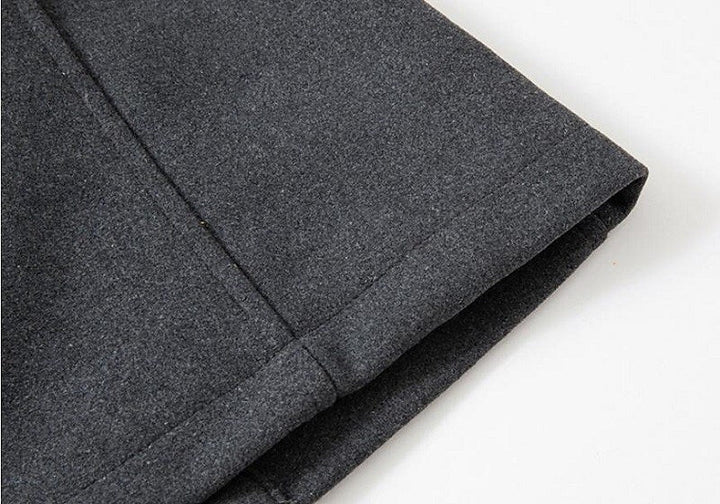 Black men's classic double-breasted pea coat, offering superior warmth and timeless style for the winter season.