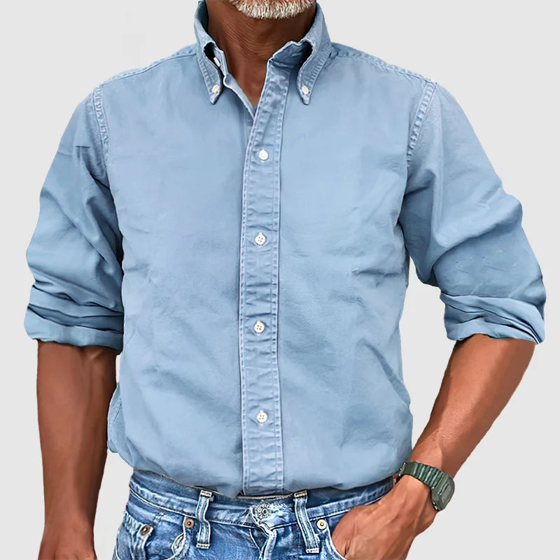 Timeless classic men's long-sleeve button-down shirt, blending style and versatility.