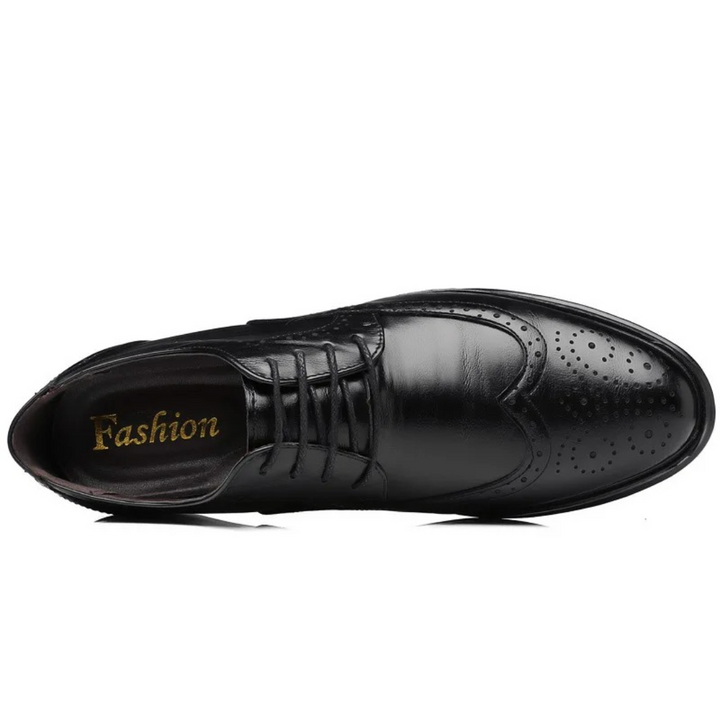 Men's traditional Oxford brogue dress shoes, offering classic style for formal, business, and smart casual outfits.
