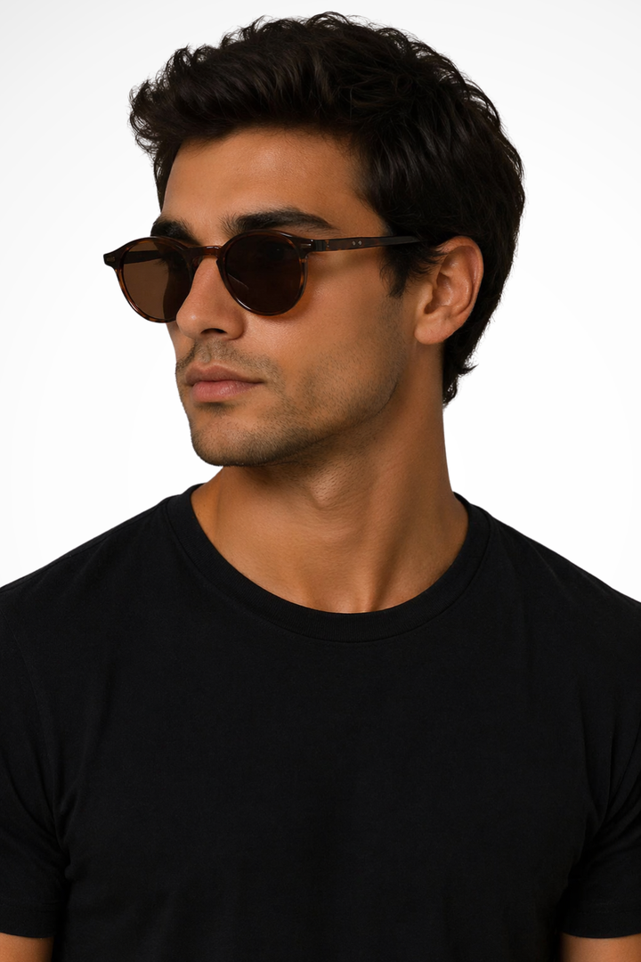 Fashionable men's round vintage sunglasses. Essential classic retro eyewear accessory.