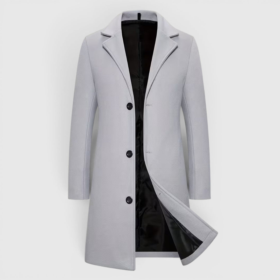 Men's long single-breasted winter overcoat, classic style for cold weather.