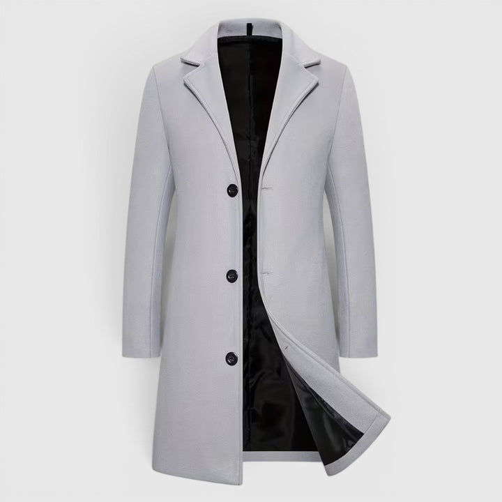 Men's long single-breasted winter overcoat, classic style for cold weather.