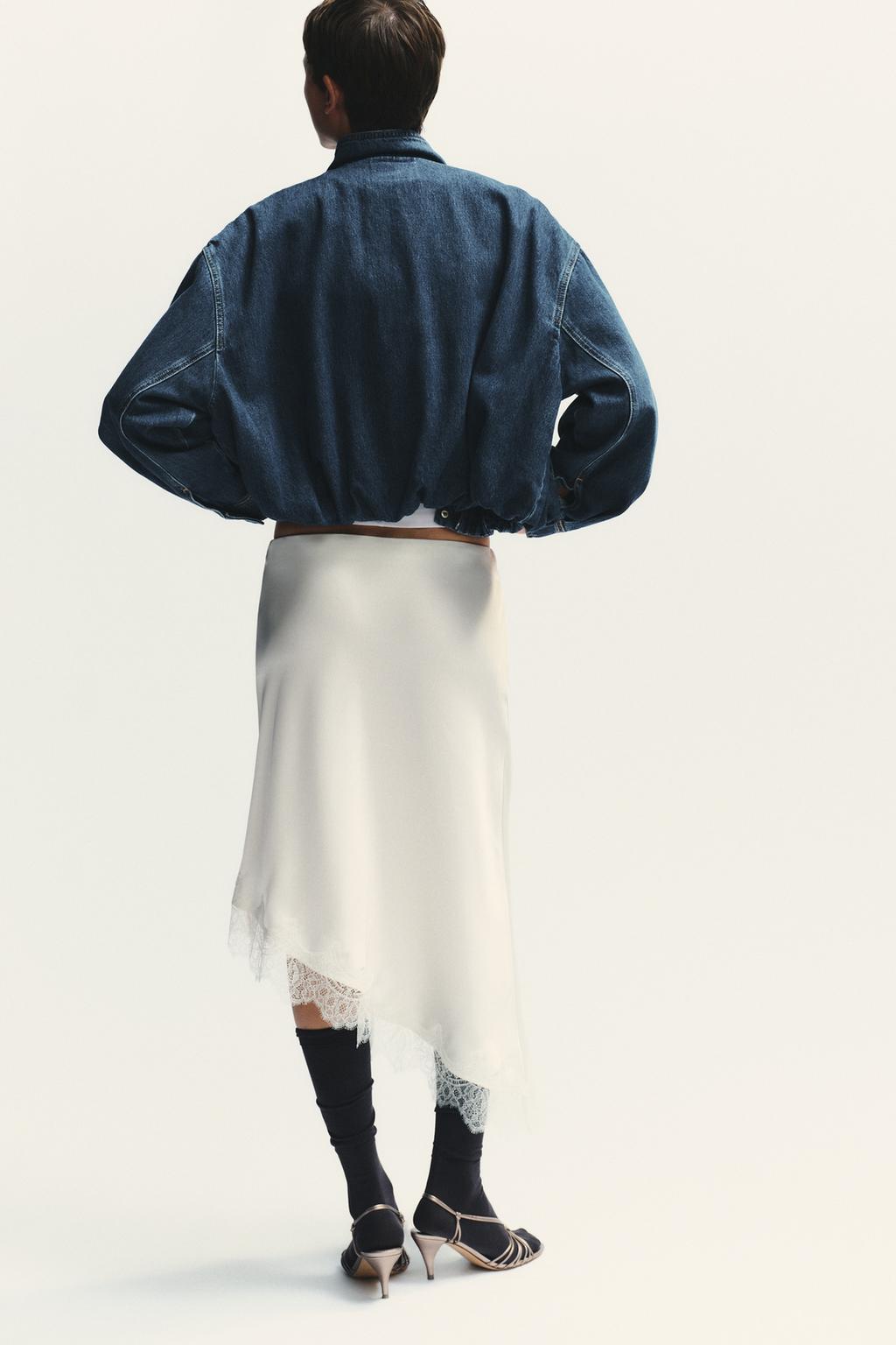 Stand collar denim jacket, offering a timeless and chic addition to your wardrobe.