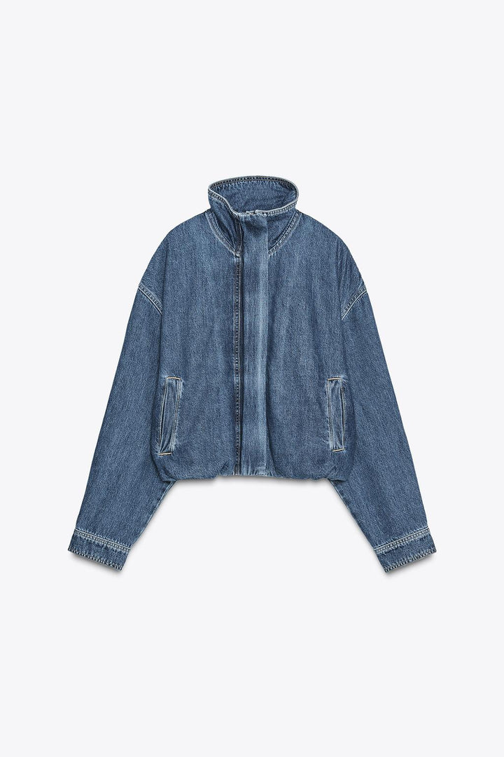 Casual women's denim jacket featuring a relaxed vintage silhouette and button front.