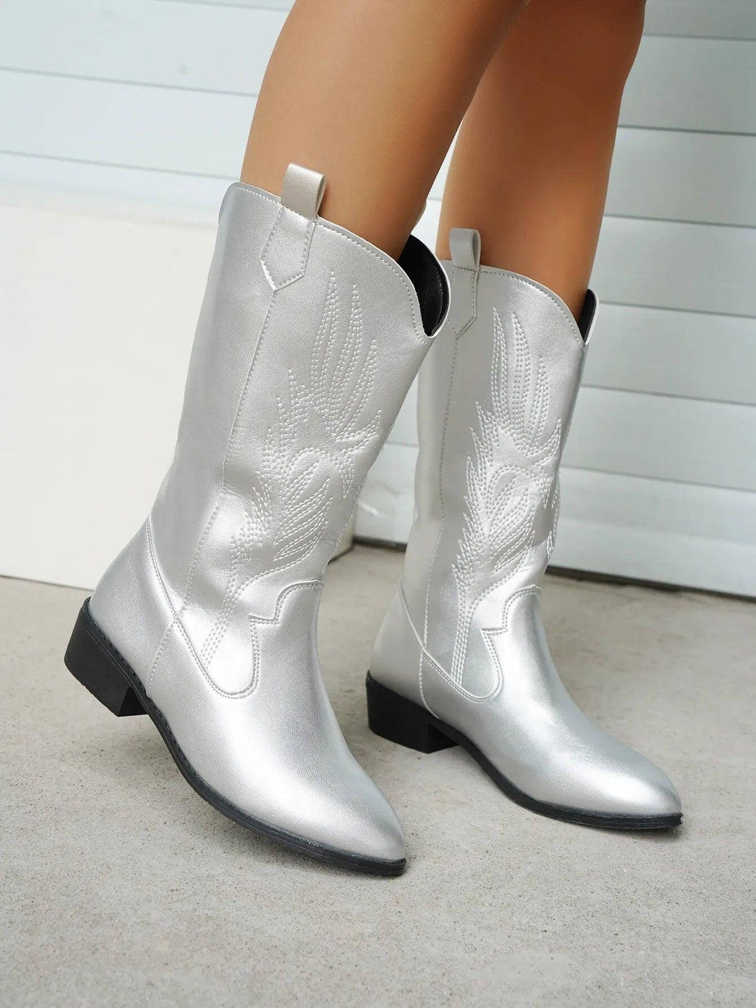 Blue women's western boots, comfortable classic style, trendy for fashion lovers.