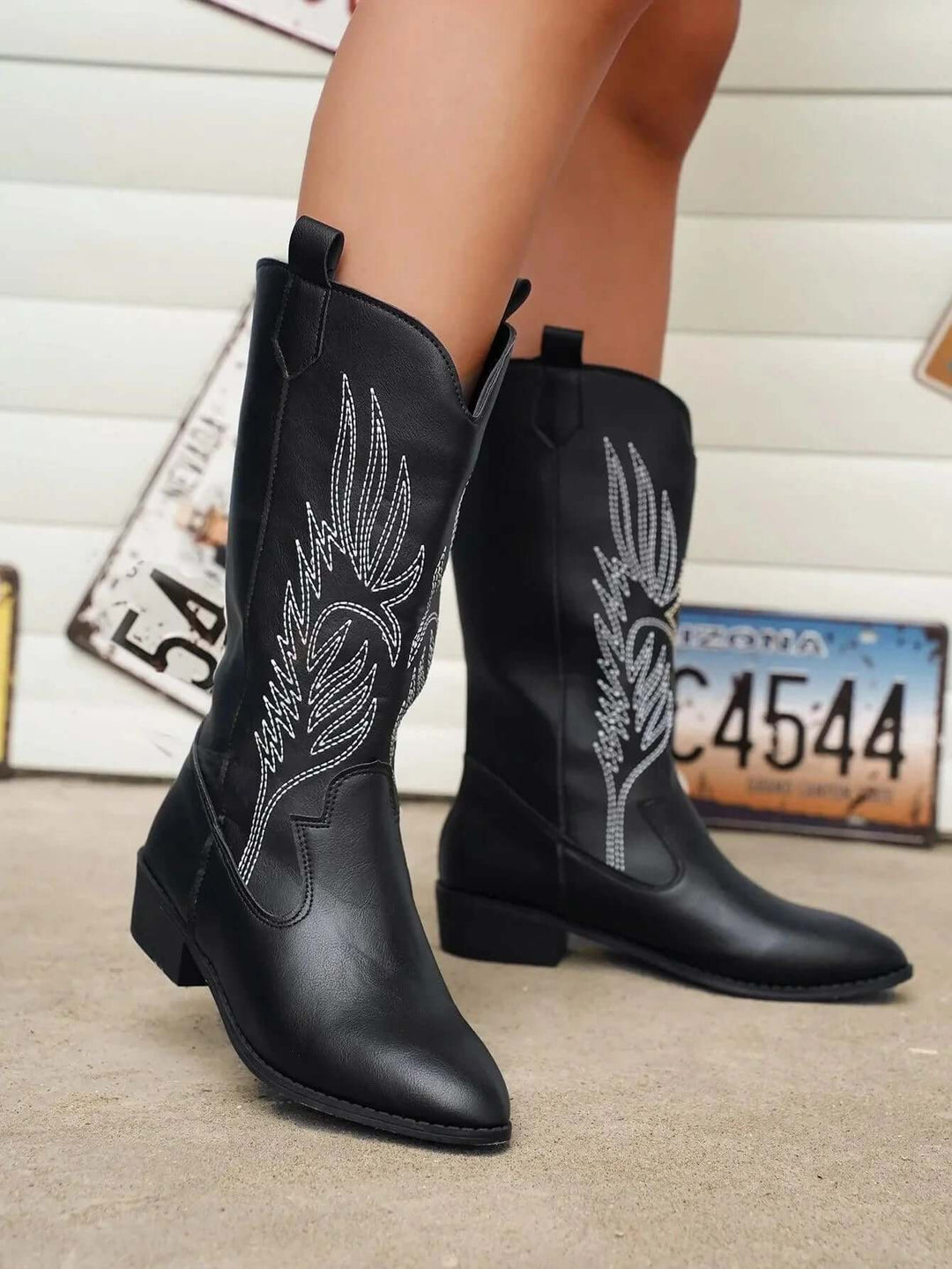Silver metallic women's cowboy boots, comfortable and trendy western statement.