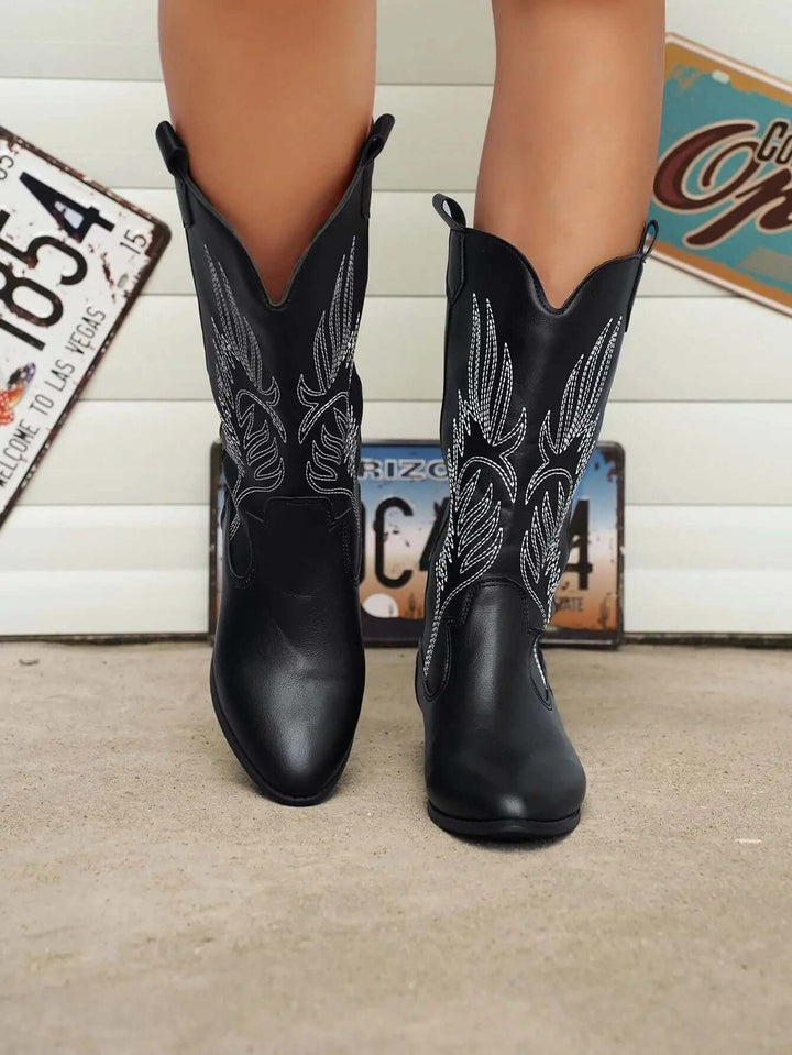 Silver women's cowboy boots, chic western style, comfortable & trendy.