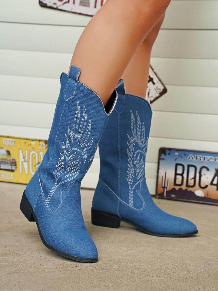 Classic blue women's cowboy boots, comfortable western style for trendy outfits.