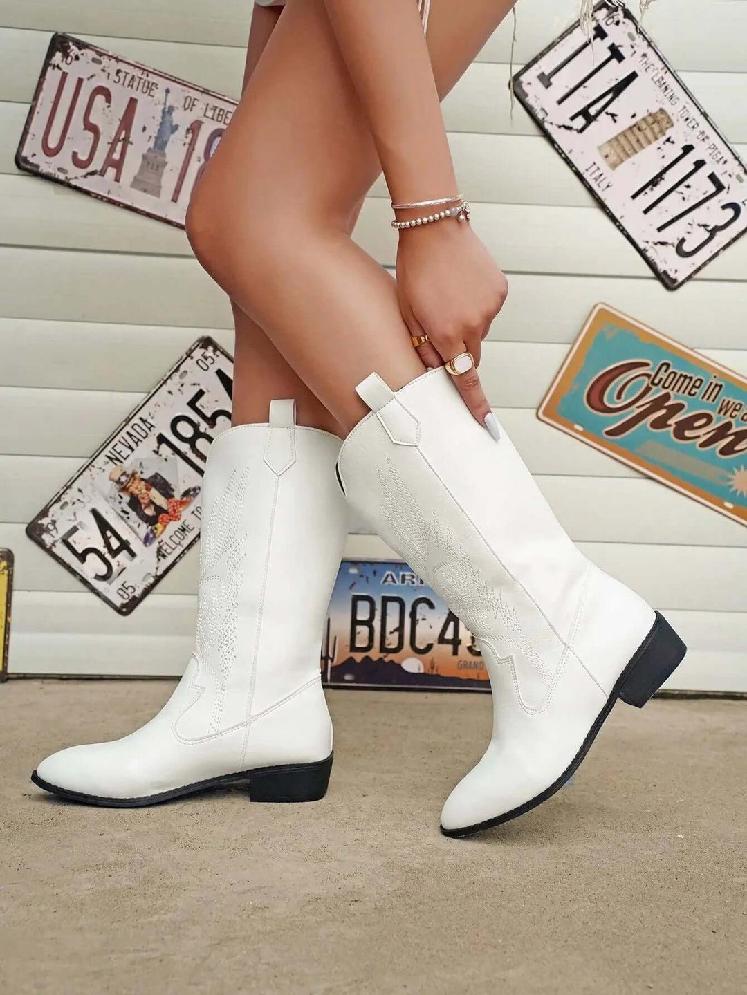Stylish white women's cowboy boots, comfortable for any western fashion ensemble.