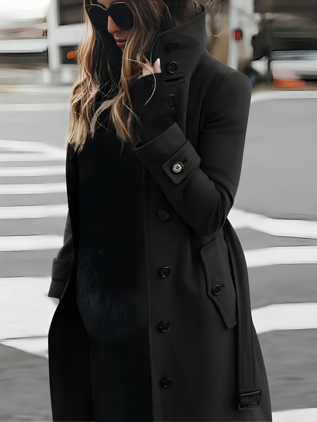 Stylish women's belted trench coat. Elegant fall/winter outerwear jacket with classic features & a warm design.