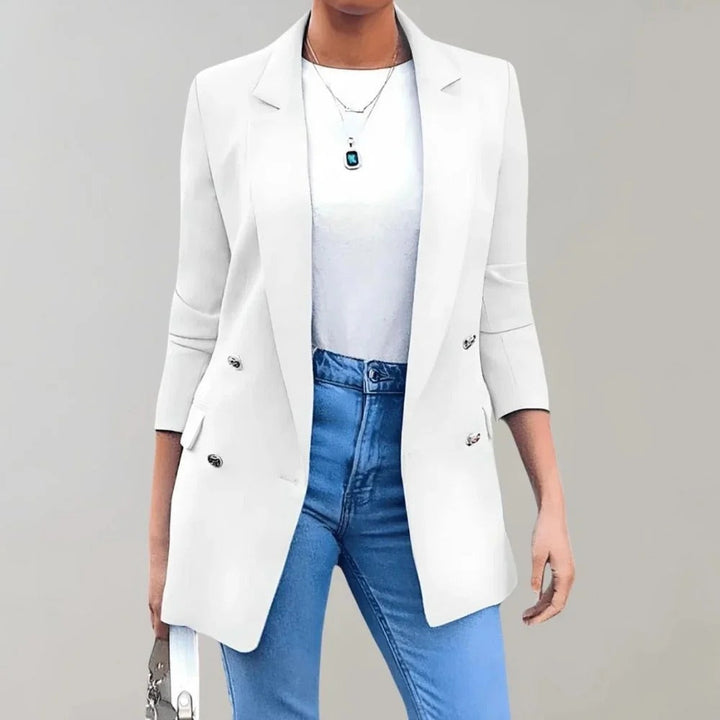 Chic women's versatile blazer, ideal for professional business & elegant smart-casual looks. Tailored.