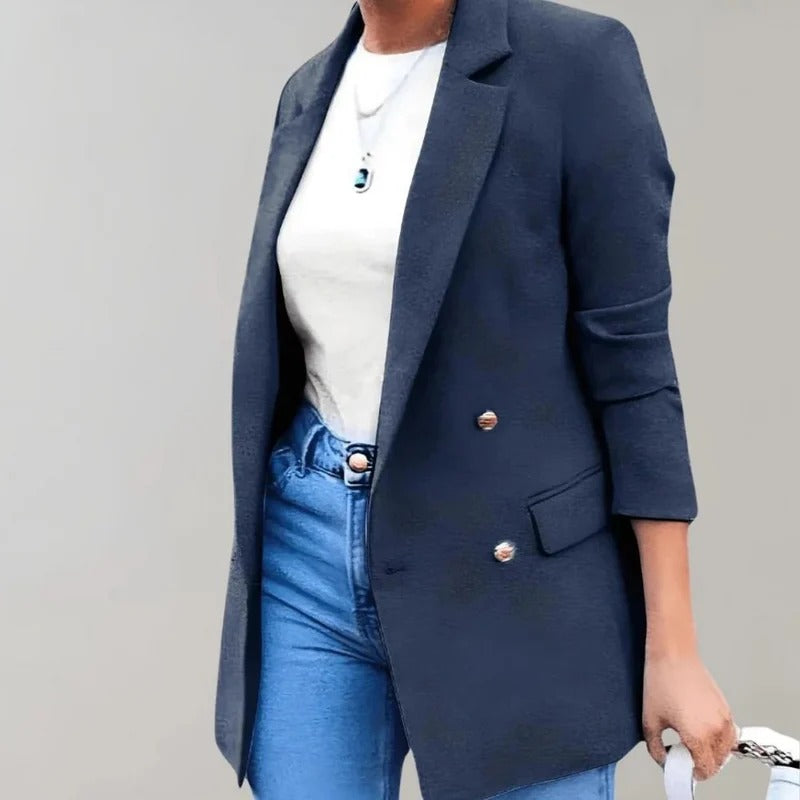 Women's classic blazer elevating professional office wear or a smart-casual outfit. Versatile jacket.