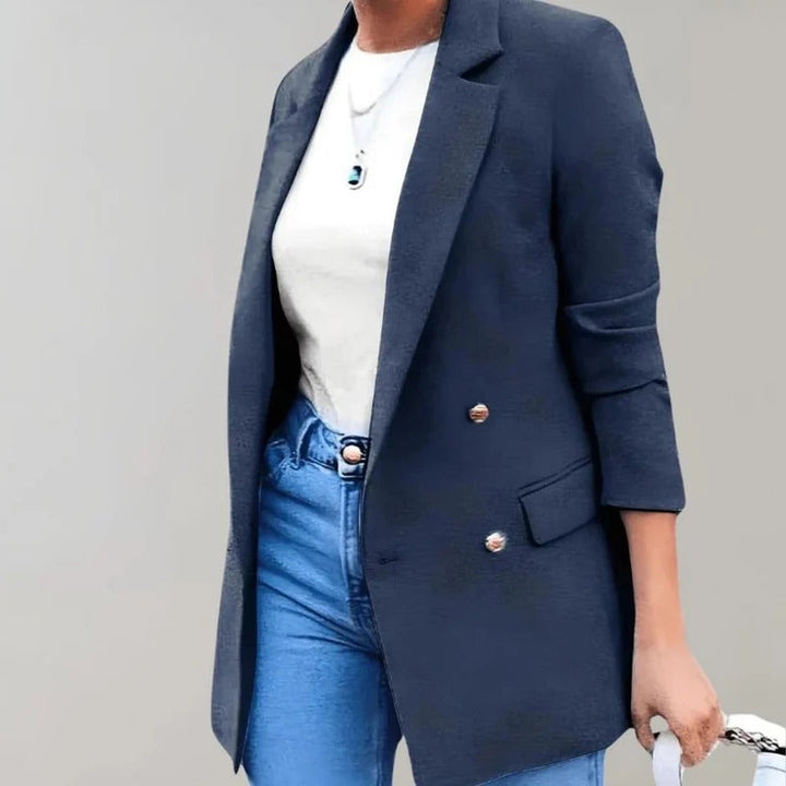 Women's classic blazer elevating professional office wear or a smart-casual outfit. Versatile jacket.