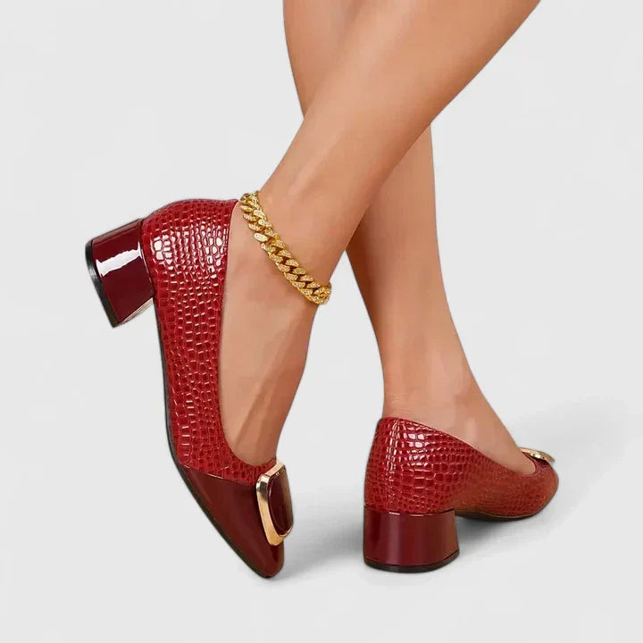Elegant women's slip-on loafers with a sturdy block heel, perfect for casual or dressy outfits.