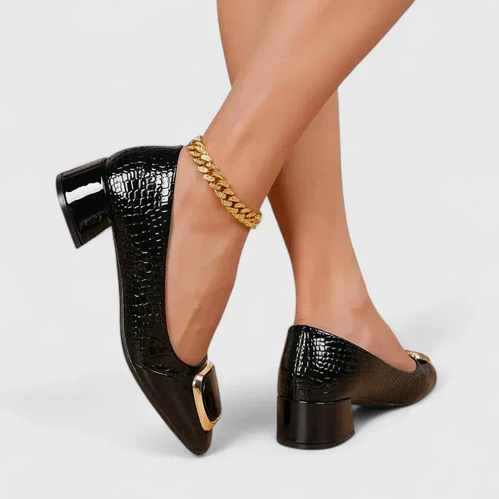 Versatile women's closed-toe loafers with a block heel, ideal for both casual & dress shoe fashion.