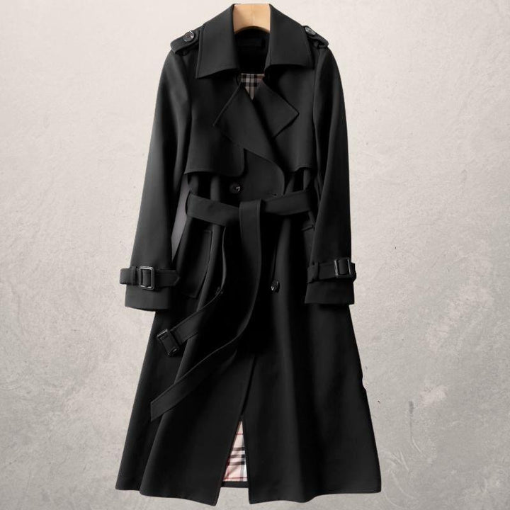 Chic women's belted long trench coat, double-breasted design, ideal for a sophisticated fall fashion look.