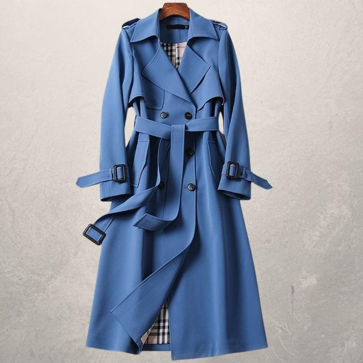 Elegant women's classic double-breasted trench coat, belted, with a stylish collar for chic spring outerwear.