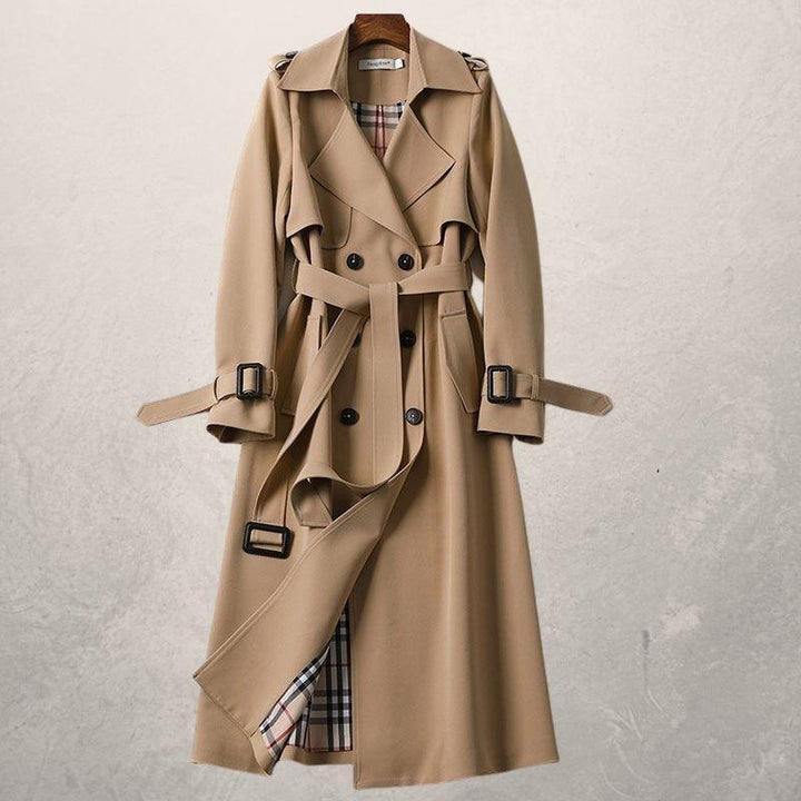 Versatile women's long double-breasted trench coat, perfect classic outerwear for elegant fall and spring fashion.